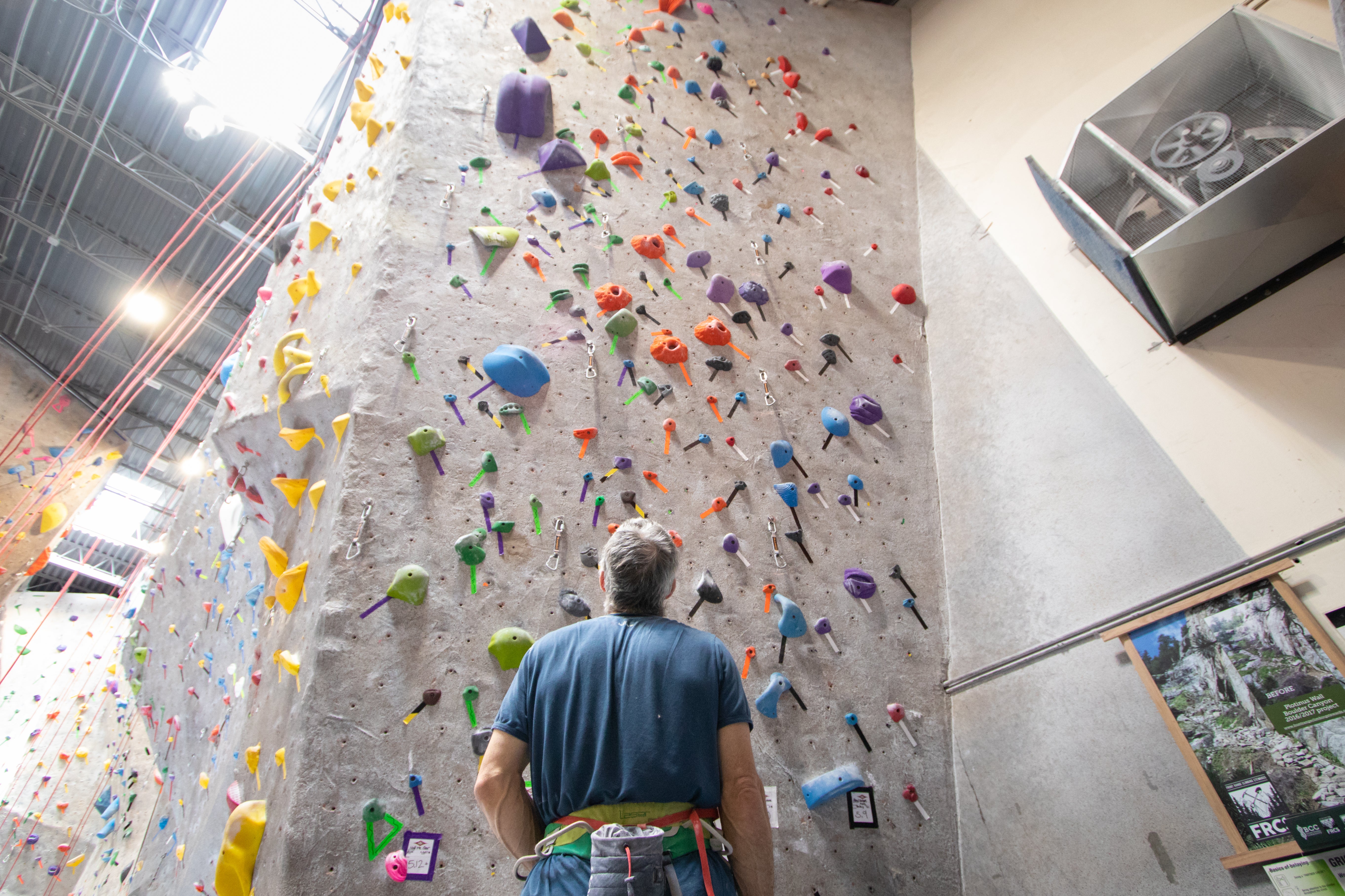 John Bachar free-soloing Outer Limits, on the Cookie Wall, Yosemite Valley, California. Climbing Magazine issue no. 84
