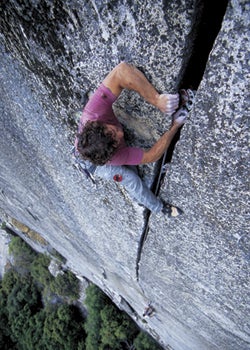 Juliet Homme tosses the rap rope from Palisade Head. The 200-foot cliff is stacked with committing climbs.