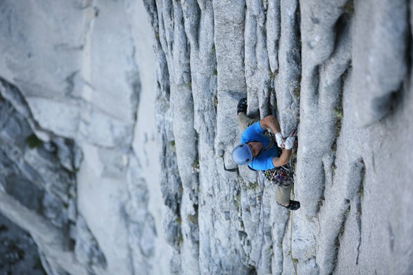 Andreas Karström on the fjord-front Tiega är guld (6, or 5.10c), Ulorna. Photo by Jonas Paulsson / jonaspaulsson.se