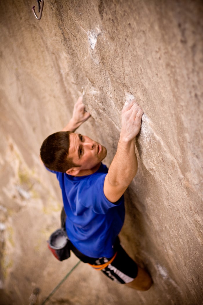Hold that pose! And hold, and hold, and hold. Kevin Jorgeson moonlight climbing in the Buttermilks. Photo by Andy Mann