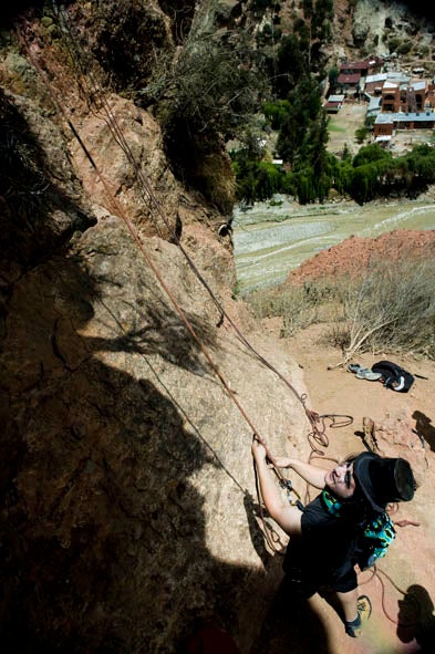 Holsten navigates the 5.10 corner on P4 of Green Drag-On (5.13a) before moving into the 5.12c crimping higher on the same pitch. Mount Persis is visible in the background. Photo by Ben Gilkison / www.bentroy.com