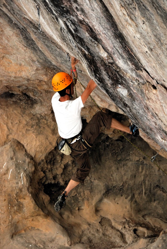 Petter Watn stretches through the crux of Beauty and the Beast (6c+). Photo by Daniel Holz / danholzphotography.com