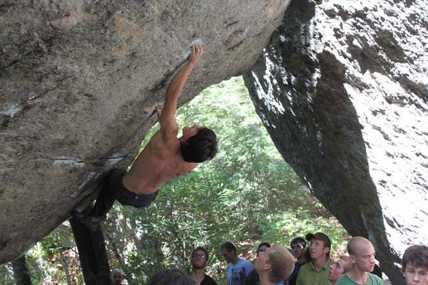 Kari, on safe ground before a jaw dropping runout on a Boulder Canyon moderate. Photo by Ben Fullerton / fullertonimages.com