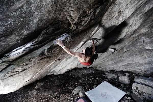 Molly Mitchell and Arno Ilgner climbing on the Roof Wall in Eldorado Canyon, Colorado. Many of the routes on this wall were freed in the 1970s, when 5.11/5.12 were cutting edge. As a result, there is some grade compression—as well as decades of built-up boot rubber and chalk—that makes these thin, vertical routes feel quite stout compared to modern sport climbs with the same ratings.