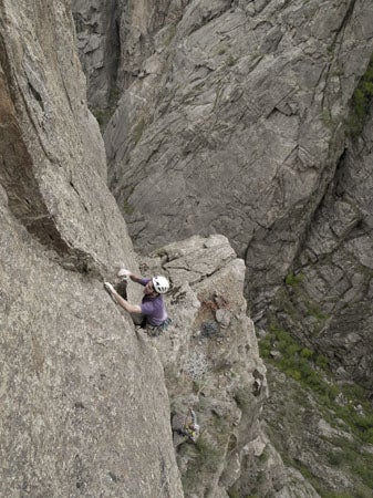 Micah Rein Hight, belayed by Wes Turner, climbs Too Pumped Chump (5.10a), Sand Rock, Alabama.