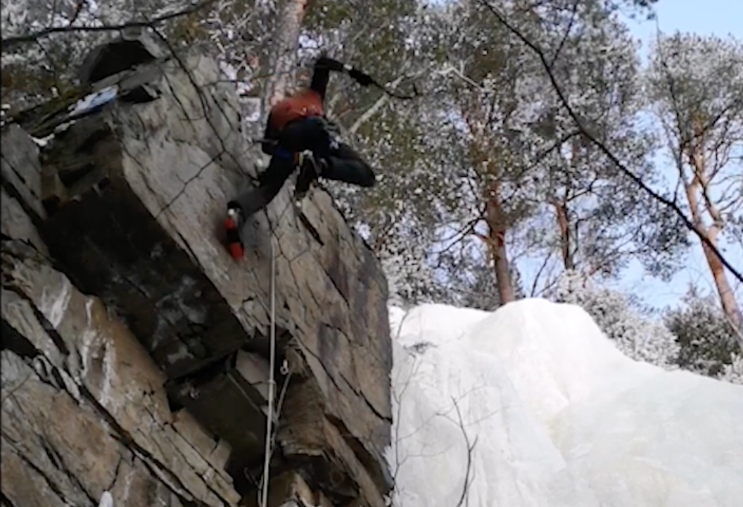 Pellinen soaking up the view on Truc et Astuce (5), the Blue Circuit (D+) at J.A. Martin.