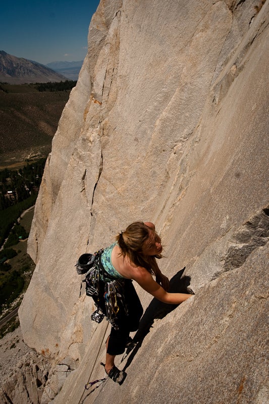 Erick Kopff heads toward “easier” ground after a steep, crimpy sequence on China Rose (5.13d), Lone Rock Point, Vermont.