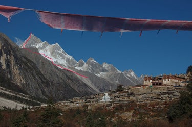 New Routes in China’s Genyen Mass New Routes in China’s Genyen Massif
