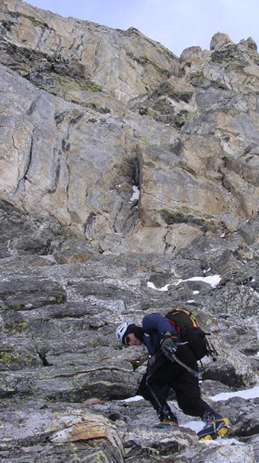 Hans Johnstone during the long approach Hans Johnstone during the long approach to Mt. Owen’s North Ridge, descending the Northeast Snowfields.