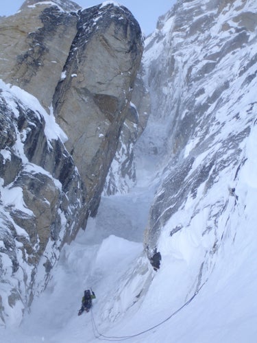 Andy Houseman leading the North Buttres Andy Houseman leading the North Buttress Couloir, the first section of the French Route on Mt. Hunter.