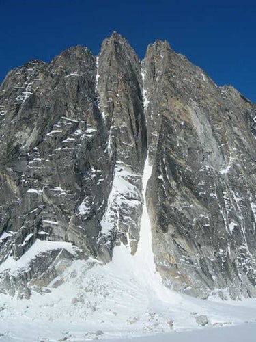 Welshman’s Peak in the Kichatna R Welshman’s Peak in the Kichatna Range, with Cool Couloir gaining the notch to the right of the summit.