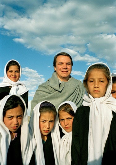 Greg Mortenson with Lalander village sc Greg Mortenson with Lalander village schoolgirls, Char Asiab valley, Afghanistan. The Central Asia Institute school here was attacked in 2007 by the…