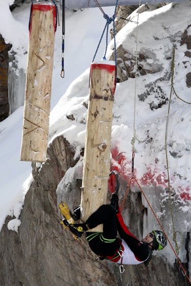 After dropping one of his tools, Will M After dropping one of his tools, Will Mayo from Vermont gamely tries to muscle up one of the dangling logs near the top of the competition route at…
