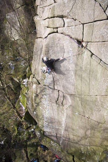 Pearson works the upper crux of The Gro Pearson works the upper crux of The Groove. Photo courtesy of Hot Aches Images.