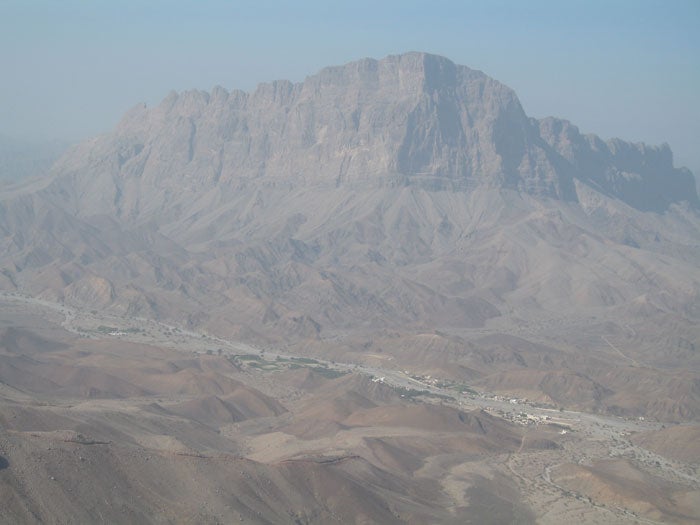 Jebel Misht in the mist—or, rather Jebel Misht in the mist—or, rather, in the desert haze. Photo by Jonathan Thesenga.