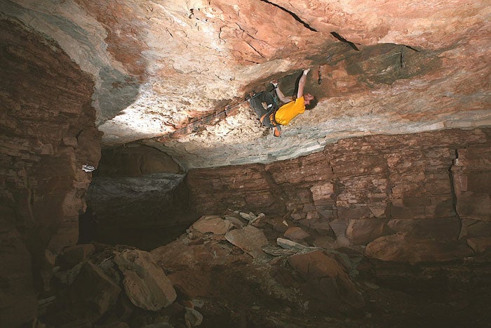 Rob Pizem working Army of Darkness (5.1 Rob Pizem working Army of Darkness (5.13d) near Moab, Utah. Photo by Andrew Burr / www.andrewburr.com.
