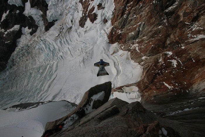 Rozov takes flight toward the Adela Gla Rozov takes flight toward the Adela Glacier, thousands of feet below. Courtesy of Mountain.ru.