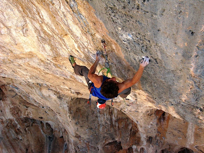 Joe Kinder at the upper crux of his new Joe Kinder at the upper crux of his new route Golden Direct (5.14c/d) at the Cathedral in southern Utah. “It has lots of cruxes, but the top…