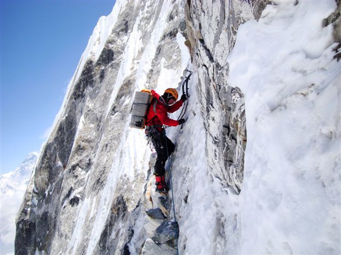 Simon Anthamatten leads steep ice on th Simon Anthamatten leads steep ice on the north face of Tengkangpoche. Courtesy of Uelisteck.ch.