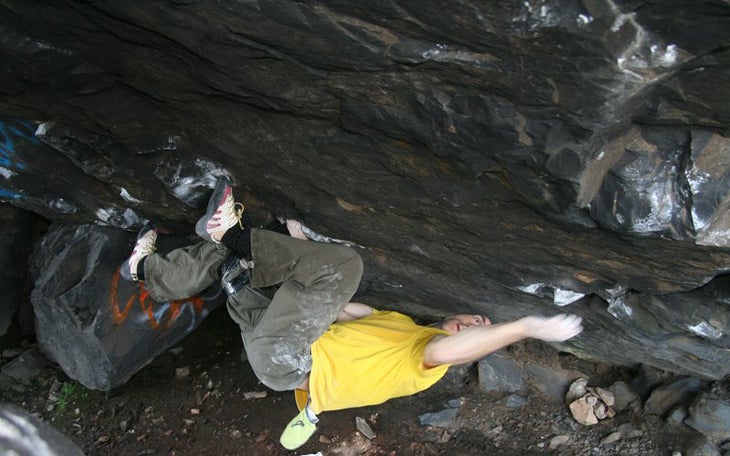 Malcolm Smith on the cave section of Gu Malcolm Smith on the cave section of Gut Buster (V14) at Dumbarton, Scotland. © Stone Country / Stonecountry.co.uk