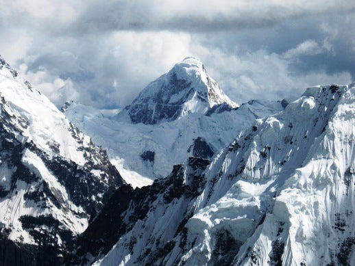 Karim Sar (6,180 meters) as seen from t Karim Sar (6,180 meters) as seen from the Baltar Glacier area to the north. Pat Deavoll Collection.