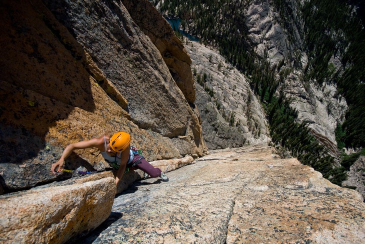 Sarah Watson placing a piece on P4 of t Sarah Watson placing a piece on P4 of the Mountaineers Route . Photo by James Q Martin / www.jamesqmartin.com