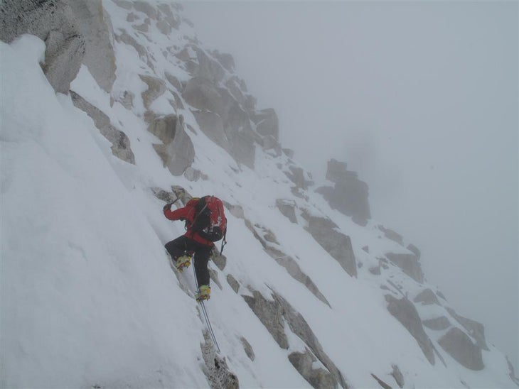Yannick Graziani bypassing a tower duri Yannick Graziani bypassing a tower during the second day of climbing on the south face of Nemjung. Photo by Christian Trommsdorff.