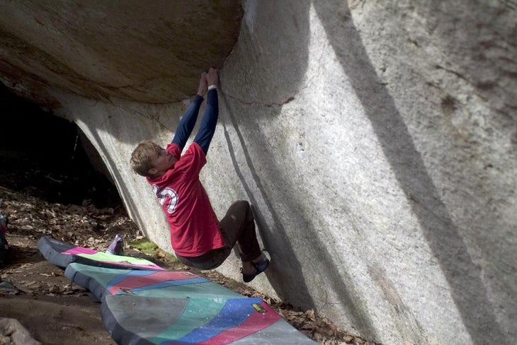 Brion Voges hucks for crimps during an Brion Voges hucks for crimps during an attempt on a Stone Fort testpiece, The Chattanoogan (V12). Photo By Luke LaeserClick here to see a photo…