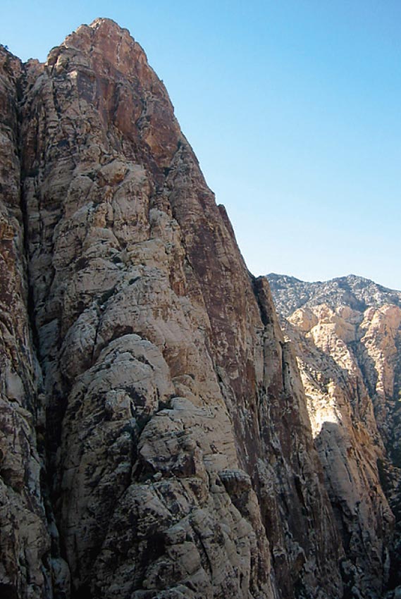 Epinephrine climbs a series of cracks, Epinephrine climbs a series of cracks, corners, chimneys and faces up the center of the prominent feature shown in this photo. Black Velvet Canyon is…