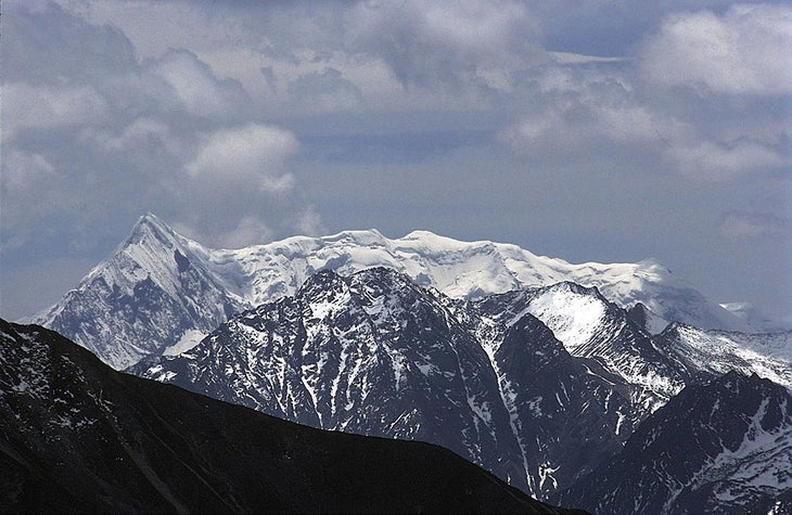“Ren Zhong Feng” (left) fro “Ren Zhong Feng” (left) from the northwest. Martin Ploug and Kristoffer Szilas reached the north ridge (left skyline) via the east face,…