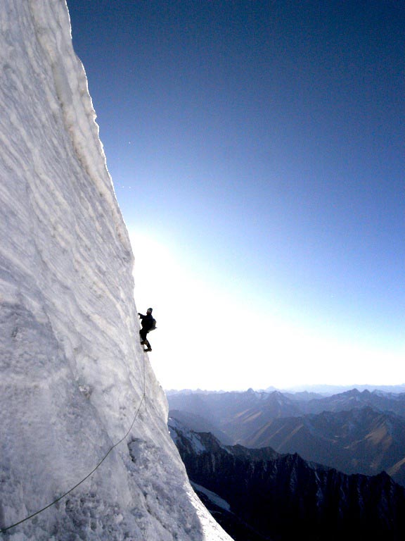 Martin Ploug on the last step before th Martin Ploug on the last step before the summit ridge. Photo by Kristoffer Szilas.