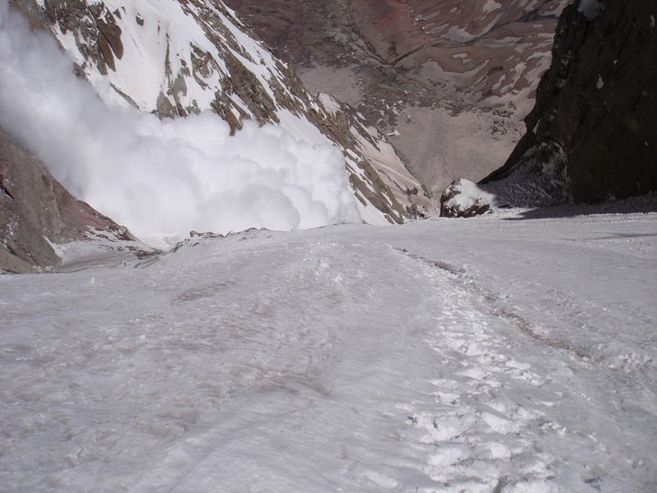 Serac avalanche sweeps the lower gully Serac avalanche sweeps the lower gully where Kellogg had ascended. Photo by Chad Kellogg.