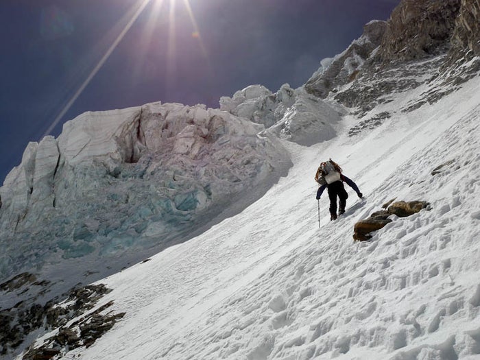 David Gottlieb breaks trail toward a gu David Gottlieb breaks trail toward a gully that bypasses the giant seracs guarding the east face of Takargo. Photo by Joe Puryear.