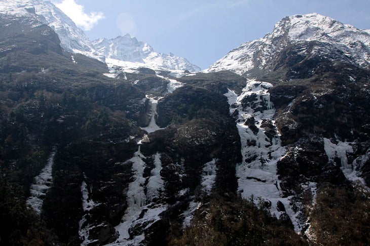 The climbs above Nemari, about 1.5 hour The climbs above Nemari, about 1.5 hours from Beding. The biggest flows are Nemari Left (4 pitches, WI5+) and Nemari Right (5 pitches, WI5). Photo by…