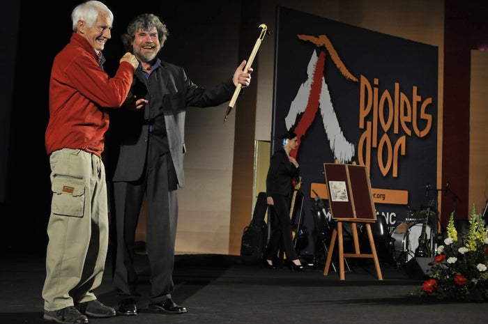 Reinhold Messner (right), recipient of Reinhold Messner (right), recipient of a Piolet d’Or for lifetime achievement, celebrates with Walter Bonatti, winner of the 2009 career Piolet d’Or.…
