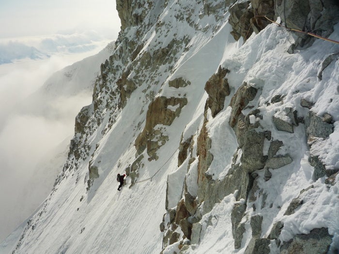 Okada follows a complex traverse on Day Okada follows a complex traverse on Day 3, high on the wall. Photo by Katsutaka Yokoyama