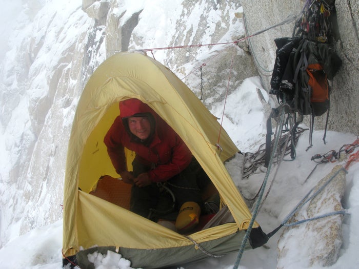 Zimmerman at the Tower bivy, high on th Zimmerman at the Tower bivy, high on the route, on the morning of summit day. Photo by Mark Allen