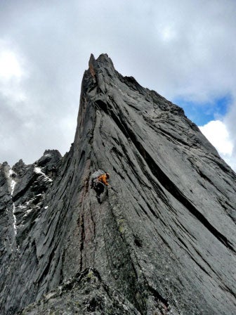 Chad Kellogg climbing good granite on P Chad Kellogg climbing good granite on Peak 5,086m. Photo by Dylan Johnson