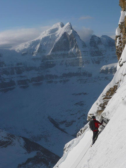 The shadowy, mile-high north face of Tw The shadowy, mile-high north face of Twins Tower, as seen from the north side of Mt. Alberta in the Canadian Rockies. Photo by Steve House