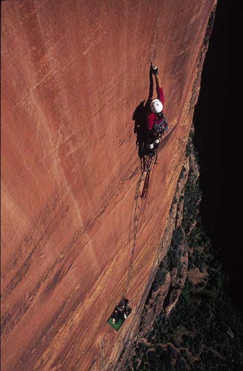 208- Eric Draper_2176.jpg Dave Littman trusting all to Beaks and Jesus (5.10 A3+), Zion National Park, UT © Photo by Eric Draper
