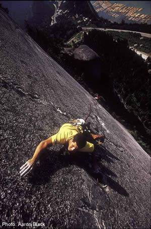 217- Aaron Black_2197.jpg Raul Sauco slab surfing on Cerberus (5.11d), Squamish, British Columbia © Photo by Aaron Black