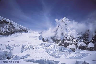 218- Jim Surette_2201.jpg Mike Graber and Dave Ruddick test the odds in Everest's Khumbu Icefall while Pumori stands guard © Photo by Jim Surette