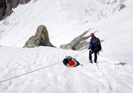 boermans-broadpeak08_1169.jpg Rescue operation of a French climber. He has been brought down from camp 3 to basecamp with HACE and HAPE.