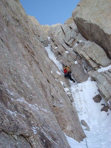 Colin Haley leading the first pitch of Colin Haley leading the first pitch of the upper corner on the Denali Diamond, headed for AI5+ overhanging ice. Photo by Mark Westman.