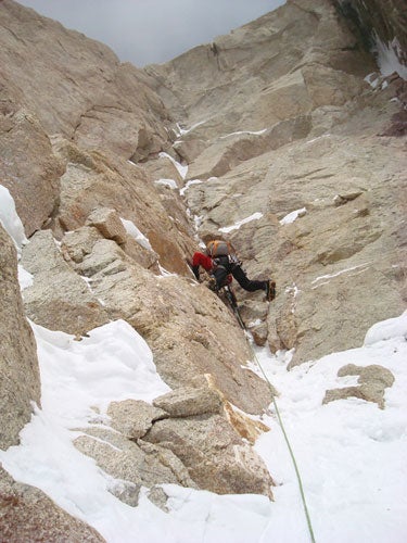 Colin Haley leads the crux pitch in the Colin Haley leads the crux pitch in the upper corner of the Denali Diamond’s rock wall. The first-ascent party in 1983 overcame a 25-foot A3…