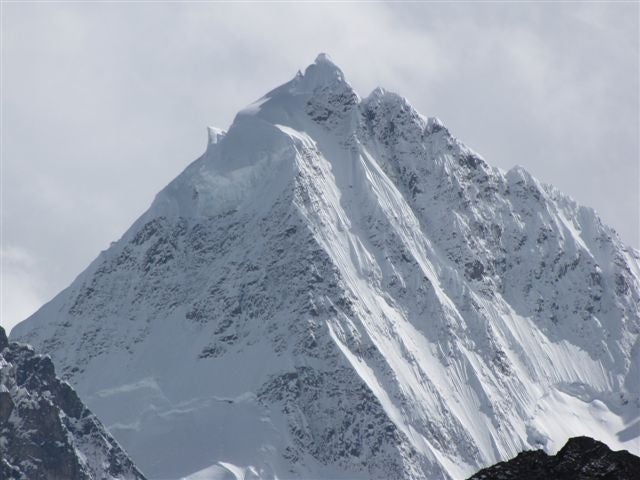 N face of Nenang 6870m seen from Niwu Q N face of Nenang 6,870m seen from Niwu Qu, NE.