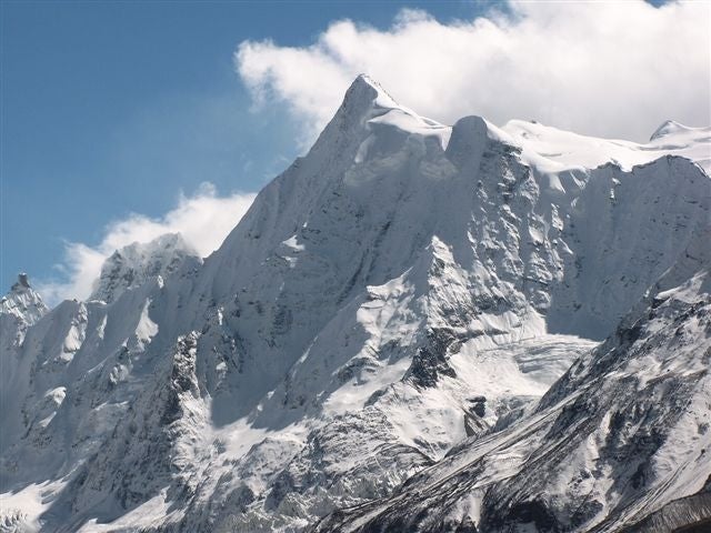N face of unnamed 6018m peak on the lef N face of unnamed 6018m peak on the left bank of the Maraipo Glacier, NE.