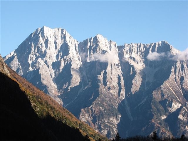 S face of rock peaks left is the highes S face of rock peaks (left is the highest, 5,500m) west of Songzong, NE.