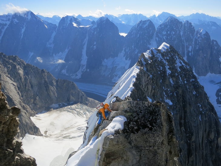 graham-following-ridge Graham Zimmerman on the upper east buttress of the Angel, with peaks above the Revelation Glacier ranged behind.