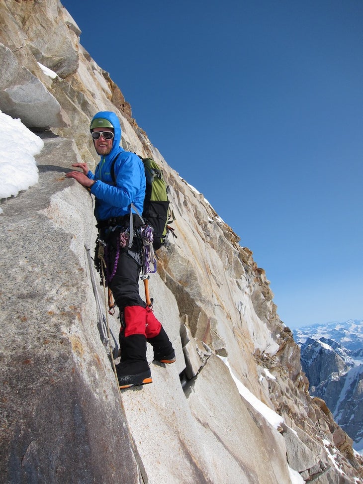 Kieran Parsons on Pk 8290 pitch 2 Kiernan Parsons starting the second pitch on the summit pyramid of Peak 8,290.